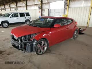 2016 Hyundai Veloster z VIN KMHTC6ADXGU273308, wystawiony jako Copart lot #83912814 z przebiegiem 131 699 mil mil oraz Szkoda całkowita • Salvage title. Historia ofert i sprzedaży dostępna na DreamBid. Obrazek 1.