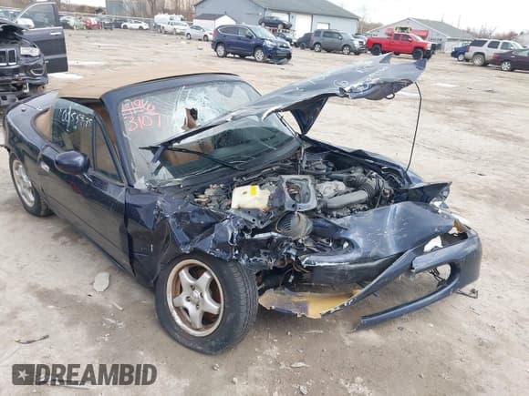 ✅ 1996 Mazda MX-5 Miata • VIN: JM1NA353XT0709160 • Lot: 41963107. Wystawiony na IAAI z przebiegiem 166 807 mil. Bezpłatny archiwum sprzedaży aukcyjnych z USA i szczegółowy raport historii pojazdu na DreamBid. Zdjęcie 6.