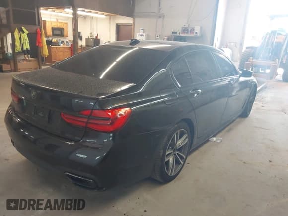 ✅ 2017 BMW 7 Series 740i xDrive • VIN: WBA7E4C59HGU99489 • Lot: 42737856. Listed on IAAI with 108,220 mi. Free auction sales archive from the USA and detailed vehicle history report at DreamBid. Image 4.