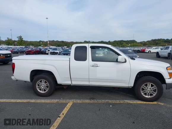 ✅ 2012 Chevrolet Colorado 1LT • VIN: 1GCJTCFE1C8160734 • Лот: 43241279. Опубликован ранее на IAAI с пробегом 135 509 миль. Бесплатный доступ к архиву аукционных продаж из США и подробный отчёт об истории автомобиля на DreamBid. Изображение 14.