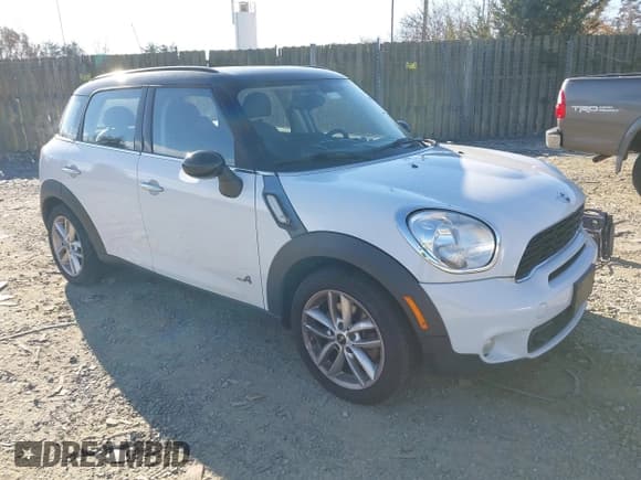 ✅ 2014 MINI Countryman S • VIN: WMWZC5C57EWP38396 • Lot: 41027727. Listed on IAAI with 147,260 mi. Free auction sales archive from the USA and detailed vehicle history report at DreamBid. Image 1.