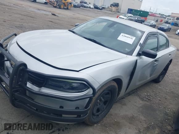 ✅ 2019 Dodge Charger Police • VIN: 2C3CDXAT0KH558288 • Lot: 42068936. Listed on IAAI with 164,154 mi. Free auction sales archive from the USA and detailed vehicle history report at DreamBid. Image 2.