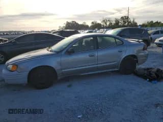 ✅ 2005 Pontiac Grand Am SE • VIN: 1G2NE52E55M222678 • Лот: 71172235. Опубликован ранее на Copart с пробегом 231 072 миль. Бесплатный доступ к архиву аукционных продаж из США и подробный отчёт об истории автомобиля на DreamBid. Изображение 1.