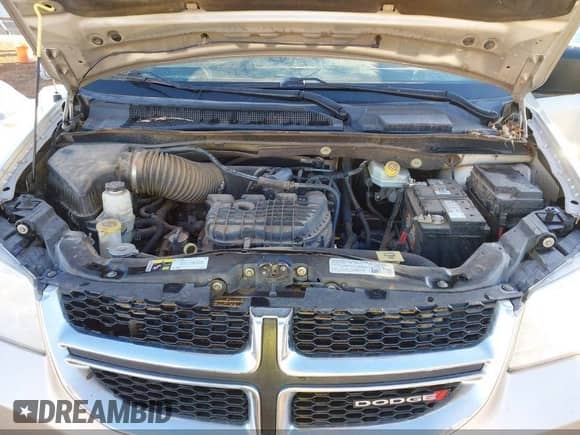 2014 Dodge Grand Caravan SE with VIN 2C4RDGBG1ER168144, listed as a IAAI auction lot 42460692 with 222,298 mi miles and . Bid and sale history available at DreamBid. Image 10.