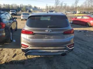 ✅ 2019 Hyundai Santa Fe SE • VIN: 5NMS2CAD0KH059929 • Lot: 70720412. Wystawiony na Copart z przebiegiem 79 003 mil. Bezpłatny archiwum sprzedaży aukcyjnych z USA i szczegółowy raport historii pojazdu na DreamBid. Zdjęcie 6.