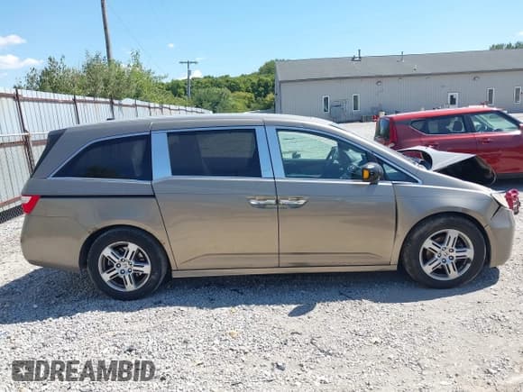 ✅ 2012 Honda Odyssey Touring • VIN: 5FNRL5H96CB018197 • Лот: 43124962. Опубликован ранее на IAAI с пробегом 225 404 миль. Бесплатный доступ к архиву аукционных продаж из США и подробный отчёт об истории автомобиля на DreamBid. Изображение 13.