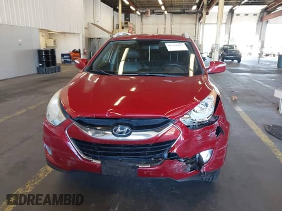 2010 Hyundai Tucson GLS with VIN KM8JUCAC5AU103469, listed as a IAAI auction lot 43394997 with 123,949 mi miles and . Bid and sale history available at DreamBid. Image 12.