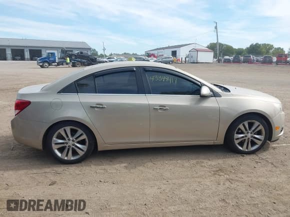 ✅ 2012 Chevrolet Cruze LTZ • VIN: 1G1PH5SC3C7256441 • Lot: 43349417. Listed on IAAI with 188,571 mi. Free auction sales archive from the USA and detailed vehicle history report at DreamBid. Image 13.