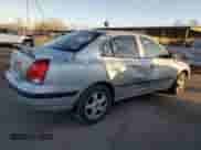 2003 Hyundai Elantra GLS z VIN KMHDN45D73U633397, wystawiony jako Copart lot #79562704 z przebiegiem 127 366 mil mil oraz Czysty tytuł • Clean title. Historia ofert i sprzedaży dostępna na DreamBid. Obrazek 3.