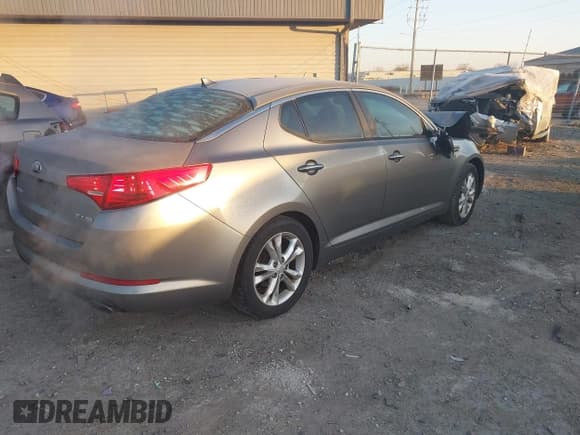 ✅ 2013 Kia Optima EX • VIN: 5XXGN4A70DG227034 • Lot: 43683961. Listed on IAAI with 221,329 mi. Free auction sales archive from the USA and detailed vehicle history report at DreamBid. Image 4.