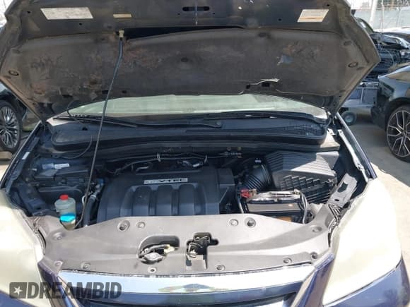 ✅ 2005 Honda Odyssey EX-L • VIN: 5FNRL38755B014776 • Lot: 42598139. Listed on IAAI with 188,522 mi. Free auction sales archive from the USA and detailed vehicle history report at DreamBid. Image 10.