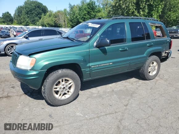 ✅ 1999 Jeep Grand Cherokee Limited • VIN: 1J4GW68S9XC652480 • Лот: 64063065. Опубликован ранее на Copart с пробегом 206 260 миль. Бесплатный доступ к архиву аукционных продаж из США и подробный отчёт об истории автомобиля на DreamBid. Изображение 1.