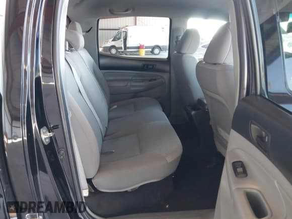 ✅ 2013 Toyota Tacoma PreRunner • VIN: 3TMJU4GN0DM145723 • Lot: 42785140. Listed on IAAI with 217,595 mi. Free auction sales archive from the USA and detailed vehicle history report at DreamBid. Image 8.