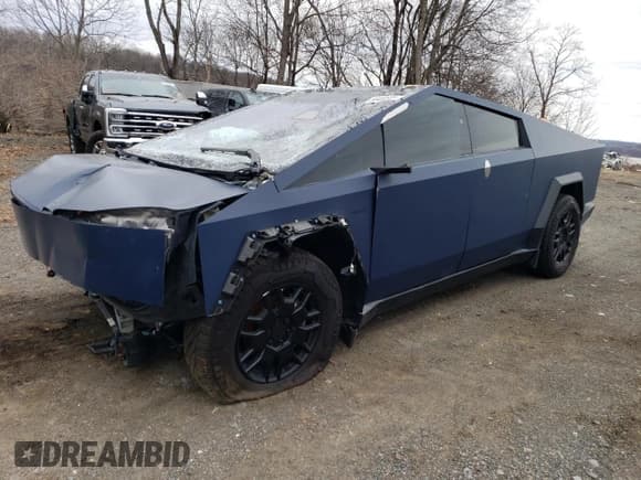 ✅ 2024 Tesla Cybertruck Cyberbeast • VIN: 7G2CEHEE3RA013268 • Лот: 50400505. Опубликован ранее на Copart с пробегом 4 869 миль. Бесплатный доступ к архиву аукционных продаж из США и подробный отчёт об истории автомобиля на DreamBid. Изображение 1.