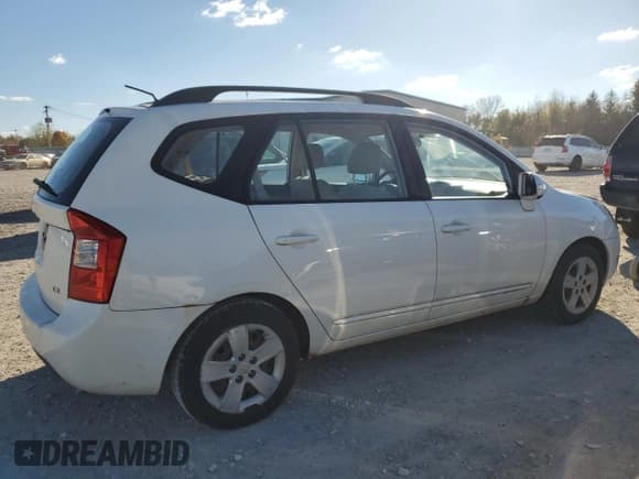 ✅ 2010 Kia Rondo • VIN: KNAHG8C95A7300131 • Лот: 90493085. Опубликован ранее на Copart с пробегом 165 011 миль. Бесплатный доступ к архиву аукционных продаж из США и подробный отчёт об истории автомобиля на DreamBid. Изображение 3.