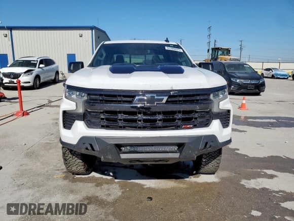 ✅ 2022 Chevrolet Silverado 1500 LT Trail Boss • VIN: 3GCUDFET3NG659222 • Lot: 91209475. Wystawiony na Copart z przebiegiem 67 285 mil. Bezpłatny archiwum sprzedaży aukcyjnych z USA i szczegółowy raport historii pojazdu na DreamBid. Zdjęcie 5.