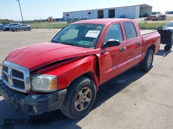 ✅ 2005 Dodge Dakota SLT • VIN: 1D7HW48N05S250364 • Лот: 43319038. Опубликован ранее на IAAI с пробегом 106 385 миль. Бесплатный доступ к архиву аукционных продаж из США и подробный отчёт об истории автомобиля на DreamBid. Изображение 2.