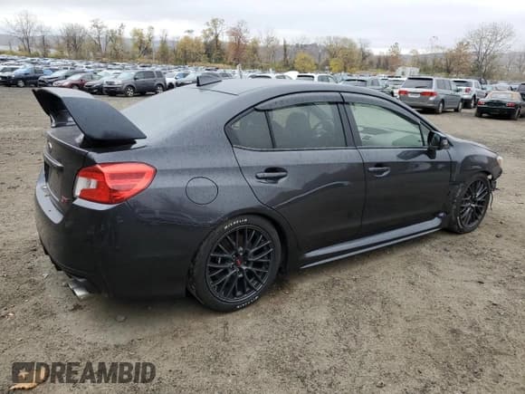 ✅ 2016 Subaru WRX STI • VIN: JF1VA2M66G9815165 • Lot: 77595524. Listed on Copart with 78,805 mi. Free auction sales archive from the USA and detailed vehicle history report at DreamBid. Image 3.