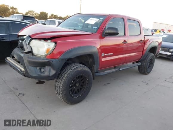 ✅ 2014 Toyota Tacoma PreRunner • VIN: 3TMJU4GN5EM159313 • Lot: 43633698. Listed on IAAI with 124,549 mi. Free auction sales archive from the USA and detailed vehicle history report at DreamBid. Image 2.