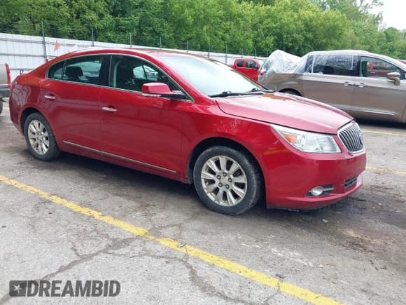 ✅ 2013 Buick LaCrosse Leather • VIN: 1G4GC5ER1DF211815 • Lot: 42372641. Listed on IAAI with 167,020 mi. Free auction sales archive from the USA and detailed vehicle history report at DreamBid. Image 1.