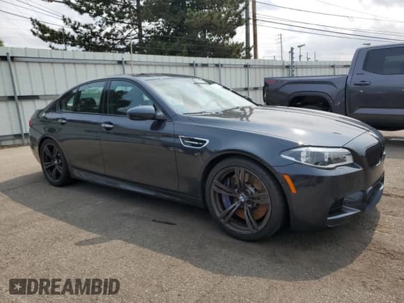 ✅ 2014 BMW M5 • VIN: WBSFV9C52ED593439 • Lot: 71907085. Wystawiony na Copart z przebiegiem 59 436 mil. Bezpłatny archiwum sprzedaży aukcyjnych z USA i szczegółowy raport historii pojazdu na DreamBid. Zdjęcie 4.
