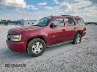 2007 Chevrolet Tahoe LS z VIN 1GNFC13J27J148240, wystawiony jako Copart lot #81129515 z przebiegiem Nie podano mil oraz Czysty tytuł • Clean title. Historia ofert i sprzedaży dostępna na DreamBid. Obrazek 1.
