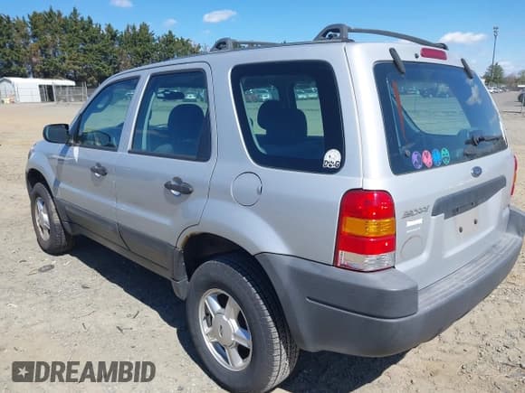 ✅ 2003 Ford Escape XLS Popular • VIN: 1FMYU92193KE09488 • Лот: 41856683. Опубликован ранее на IAAI с пробегом 159 062 миль. Бесплатный доступ к архиву аукционных продаж из США и подробный отчёт об истории автомобиля на DreamBid. Изображение 3.