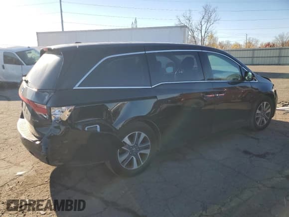 ✅ 2017 Honda Odyssey Touring • VIN: 5FNRL5H94HB009506 • Лот: 91265885. Опубликован ранее на Copart с пробегом 91 981 миль. Бесплатный доступ к архиву аукционных продаж из США и подробный отчёт об истории автомобиля на DreamBid. Изображение 3.