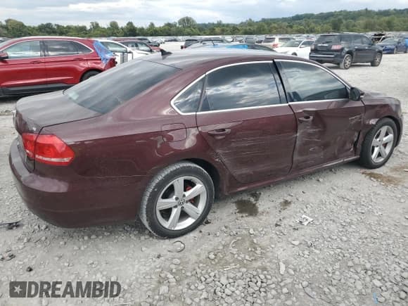 ✅ 2013 Volkswagen Passat SE • VIN: 1VWBP7A32DC009581 • Lot: 85579565. Listed on Copart with 122,576 mi. Free auction sales archive from the USA and detailed vehicle history report at DreamBid. Image 3.