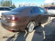 ✅ 2014 Volkswagen Jetta TDI w/Premium/Nav • VIN: 3VWLL7AJ3EM388993 • Lot: 41750316. Listed on IAAI with 162,755 mi. Free auction sales archive from the USA and detailed vehicle history report at DreamBid. Image 4.