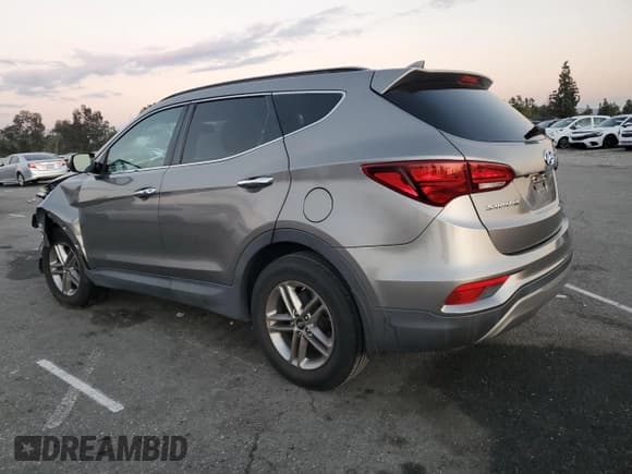 ✅ 2018 Hyundai Santa Fe 2.4L • VIN: 5NMZU3LB0JH056211 • Lot: 93690255. Listed on Copart with 75,202 mi. Free auction sales archive from the USA and detailed vehicle history report at DreamBid. Image 2.