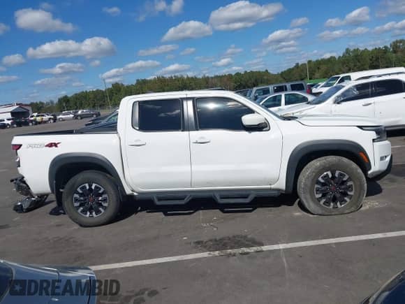 ✅ 2023 Nissan Frontier SV • VIN: 1N6ED1EKXPN630337 • Lot: 43387005. Listed on IAAI with 41,703 mi. Free auction sales archive from the USA and detailed vehicle history report at DreamBid. Image 13.