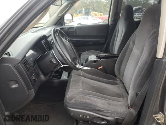 ✅ 2004 Dodge Dakota SLT • VIN: 1D7HG48N54S721985 • Lot: 81487634. Wystawiony na Copart z przebiegiem 228 354 mil. Bezpłatny archiwum sprzedaży aukcyjnych z USA i szczegółowy raport historii pojazdu na DreamBid. Zdjęcie 7.