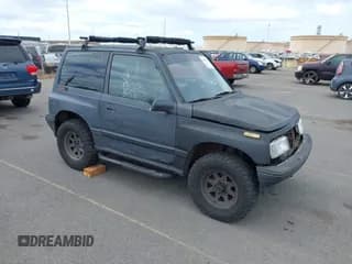 ✅ 1995 Geo Tracker • VIN: 2CNBJ1866S6903070 • Лот: 42756444. Опубликован ранее на IAAI с пробегом 99 427 миль. Бесплатный доступ к архиву аукционных продаж из США и подробный отчёт об истории автомобиля на DreamBid. Изображение 1.