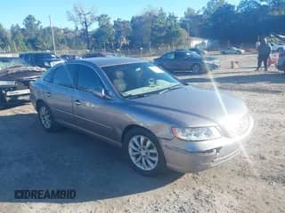 2007 Hyundai Azera SE with VIN KMHFC46F77A241574, listed as a IAAI auction lot 43472467 with 153,943 mi miles and . Bid and sale history available at DreamBid. Image 1.