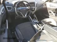 ✅ 2013 Hyundai Veloster w/Gray Int • VIN: KMHTC6AD6DU154098 • Lot: 77260374. Wystawiony na Copart z przebiegiem 159 049 mil. Bezpłatny archiwum sprzedaży aukcyjnych z USA i szczegółowy raport historii pojazdu na DreamBid. Zdjęcie 8.