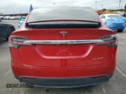 ✅ 2021 Tesla Model X Long Range Plus • VIN: 5YJXCBE24MF324376 • Lot: 66379595. Listed on Copart with 50,866 mi. Free auction sales archive from the USA and detailed vehicle history report at DreamBid. Image 6.