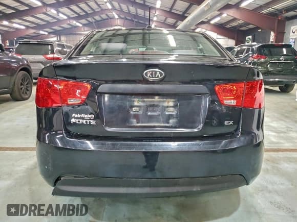 ✅ 2013 Kia Forte EX • VIN: KNAFU4A20D5739218 • Лот: 93898405. Опубликован ранее на Copart с пробегом 264 573 миль. Бесплатный доступ к архиву аукционных продаж из США и подробный отчёт об истории автомобиля на DreamBid. Изображение 6.