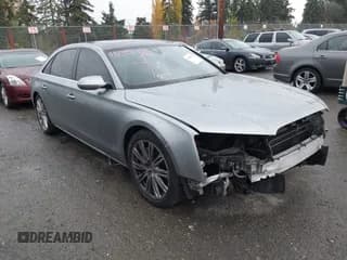 ✅ 2012 Audi A8 • VIN: WAURVAFD7CN012806 • Lot: 43609557. Listed on IAAI with 156,917 mi. Free auction sales archive from the USA and detailed vehicle history report at DreamBid. Image 1.