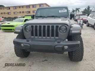 ✅ 2023 Jeep Wrangler Sport • VIN: 1C4HJXDGXPW647206 • Лот: 90620895. Опубликован ранее на Copart с пробегом 29 153 миль. Бесплатный доступ к архиву аукционных продаж из США и подробный отчёт об истории автомобиля на DreamBid. Изображение 5.