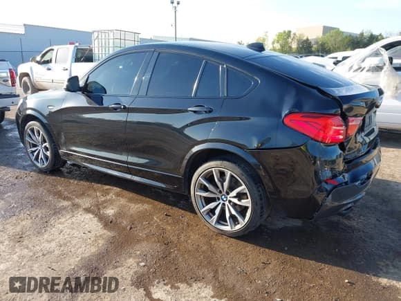 ✅ 2016 BMW X4 M40i • VIN: 5UXXW7C59G0M91223 • Lot: 42009394. Listed on IAAI with 144,771 mi. Free auction sales archive from the USA and detailed vehicle history report at DreamBid. Image 3.