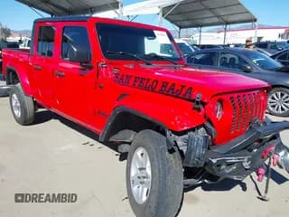 ✅ 2022 Jeep Gladiator Willys Sport • VIN: 1C6HJTAG0NL180848 • Lot: 41778129. Wystawiony na IAAI z przebiegiem Nie podano. Bezpłatny archiwum sprzedaży aukcyjnych z USA i szczegółowy raport historii pojazdu na DreamBid. Zdjęcie 1.