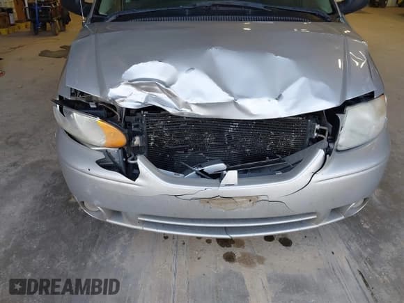 ✅ 2005 Dodge Caravan SXT • VIN: 2D4GP44L15R459026 • Lot: 43711842. Listed on IAAI with 203,644 mi. Free auction sales archive from the USA and detailed vehicle history report at DreamBid. Image 6.