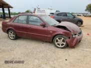 ✅ 2003 Mazda Protege DX • VIN: JM1BJ225330187720 • Lot: 49410114. Wystawiony na Copart z przebiegiem 241 491 mil. Bezpłatny archiwum sprzedaży aukcyjnych z USA i szczegółowy raport historii pojazdu na DreamBid. Zdjęcie 4.