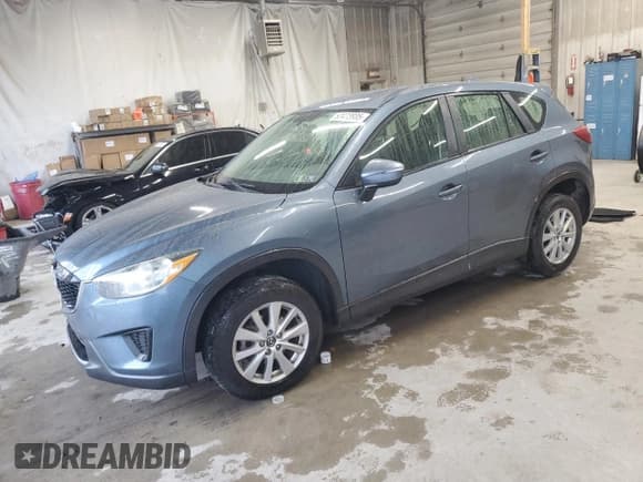 ✅ 2015 Mazda CX-5 Sport • VIN: JM3KE4BY0F0478892 • Lot: 82473935. Listed on Copart with 117,659 mi. Free auction sales archive from the USA and detailed vehicle history report at DreamBid. Image 1.
