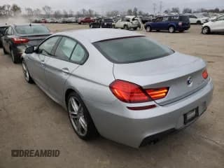 ✅ 2015 BMW 6 Series 640i • VIN: WBA6A0C5XFD318012 • Lot: 67532762. Listed on Copart with 66,036 mi. Free auction sales archive from the USA and detailed vehicle history report at DreamBid. Image 3.
