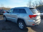 ✅ 2012 Jeep Grand Cherokee Laredo • VIN: 1C4RJFAG9CC185557 • Лот: 43787014. Опубликован ранее на IAAI с пробегом 195 839 миль. Бесплатный доступ к архиву аукционных продаж из США и подробный отчёт об истории автомобиля на DreamBid. Изображение 3.