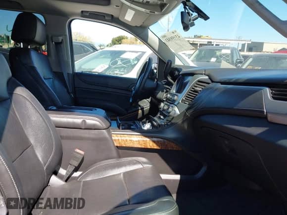 2015 Chevrolet Tahoe LTZ z VIN 1GNSCCKC4FR510792, wystawiony jako IAAI lot #43359343 z przebiegiem 215 235 mil mil oraz . Historia ofert i sprzedaży dostępna na DreamBid. Obrazek 5.