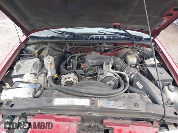 2003 Chevrolet Blazer LS z VIN 1GNCT18X93K171504, wystawiony jako IAAI lot #41682798 z przebiegiem 74 017 mil mil oraz . Historia ofert i sprzedaży dostępna na DreamBid. Obrazek 10.