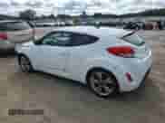 2017 Hyundai Veloster z VIN KMHTC6AD9HU316618, wystawiony jako Copart lot #70060254 z przebiegiem 76 823 mil mil oraz Czysty tytuł • Clean title. Historia ofert i sprzedaży dostępna na DreamBid. Obrazek 2.
